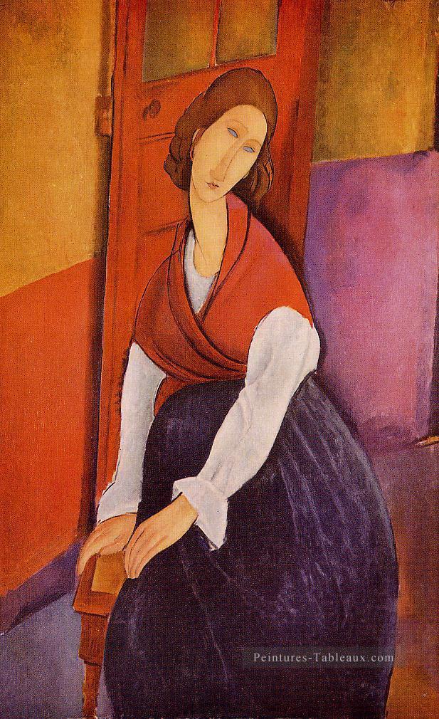 jeanne hebuterne devant une porte 1919 Amedeo Modigliani Peintures à l'huile